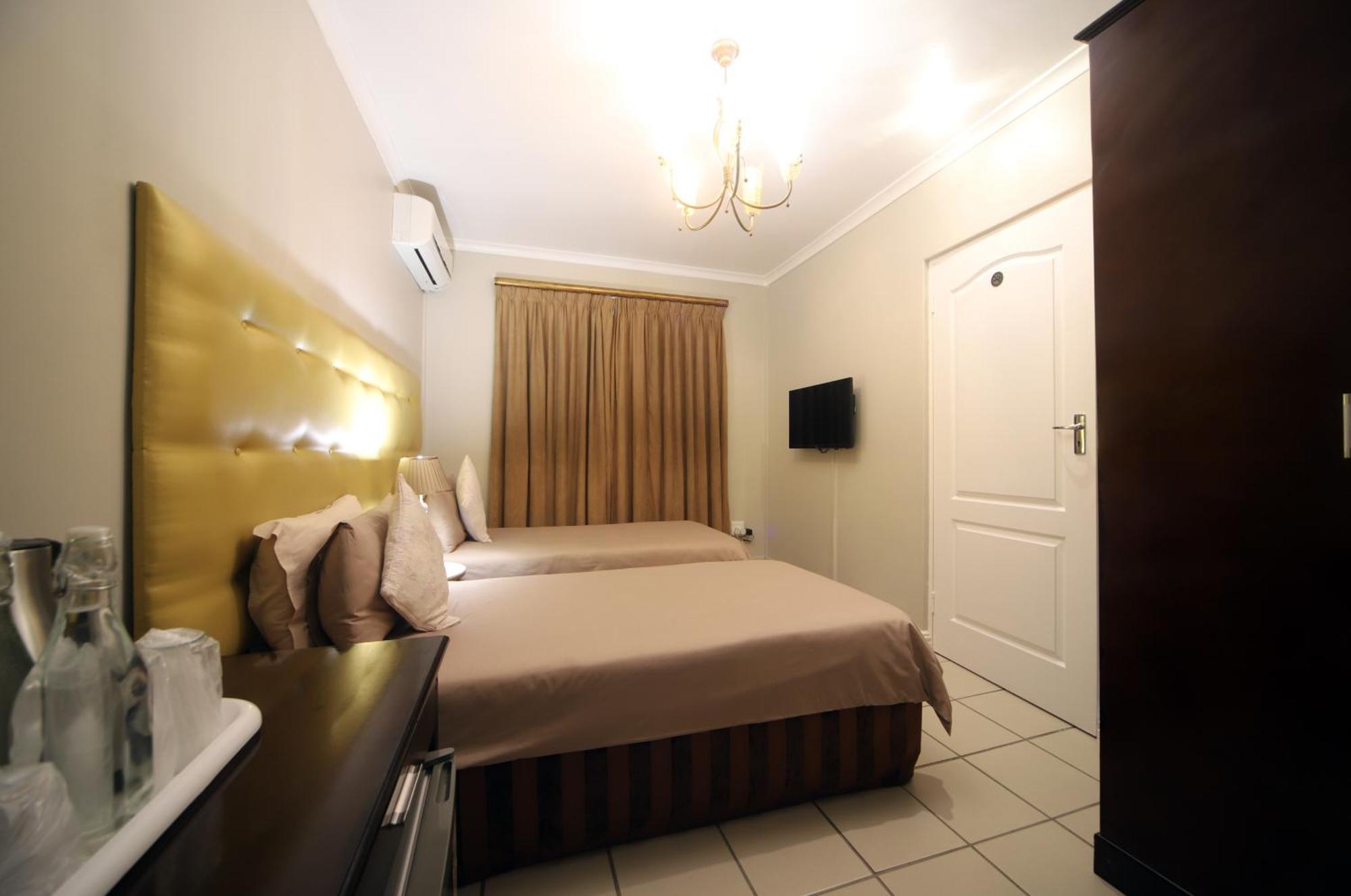Savoy Lodge Cape Town Bilik gambar